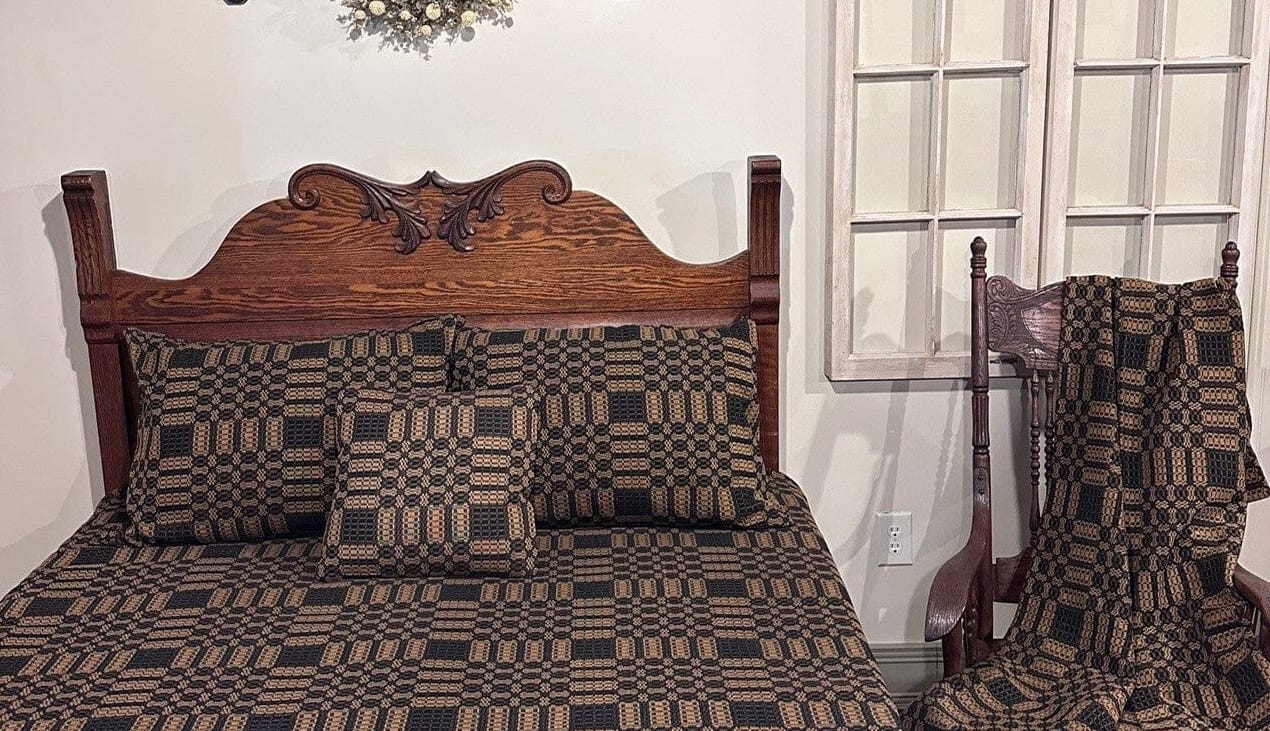 Westbury black and mustard woven coverlet shown in room scene